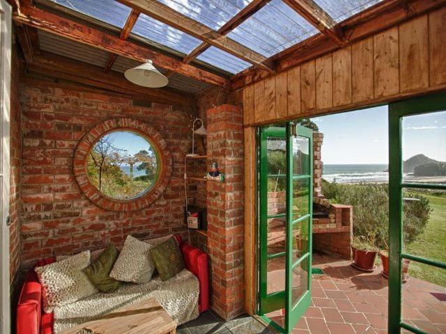 Bethells Beach Cottages ภายนอก รูปภาพ